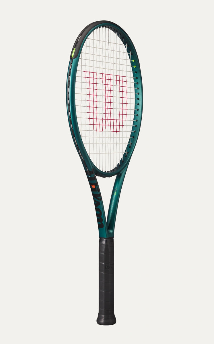 Tennis racket with Wilson logo on a white background