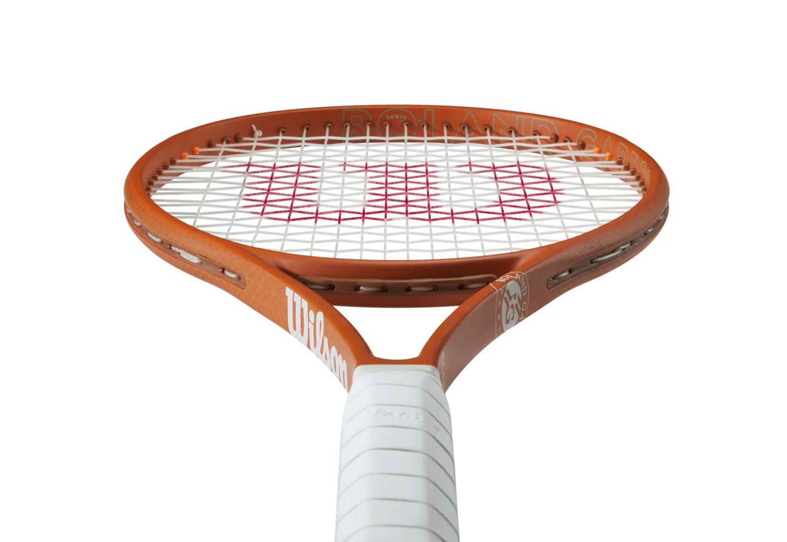 Tennis racket with orange frame and white handle on a white background