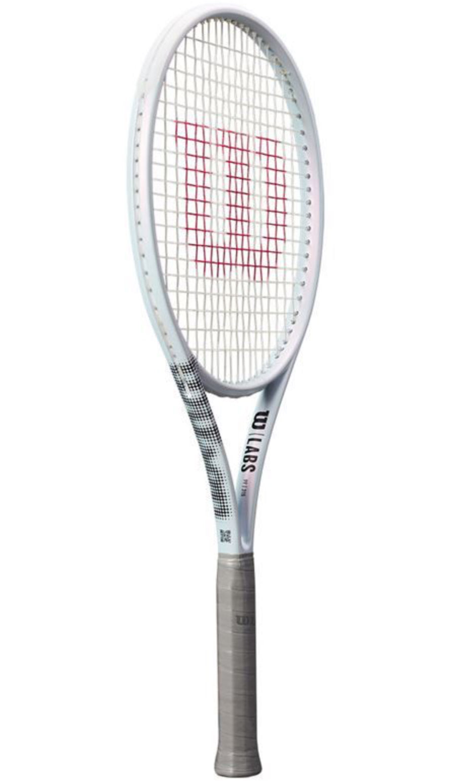 Tennis racket with Wilson logo on a white background