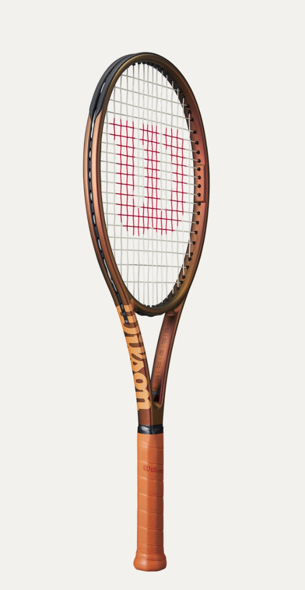 Tennis racket with a wooden handle and brown frame on a white background