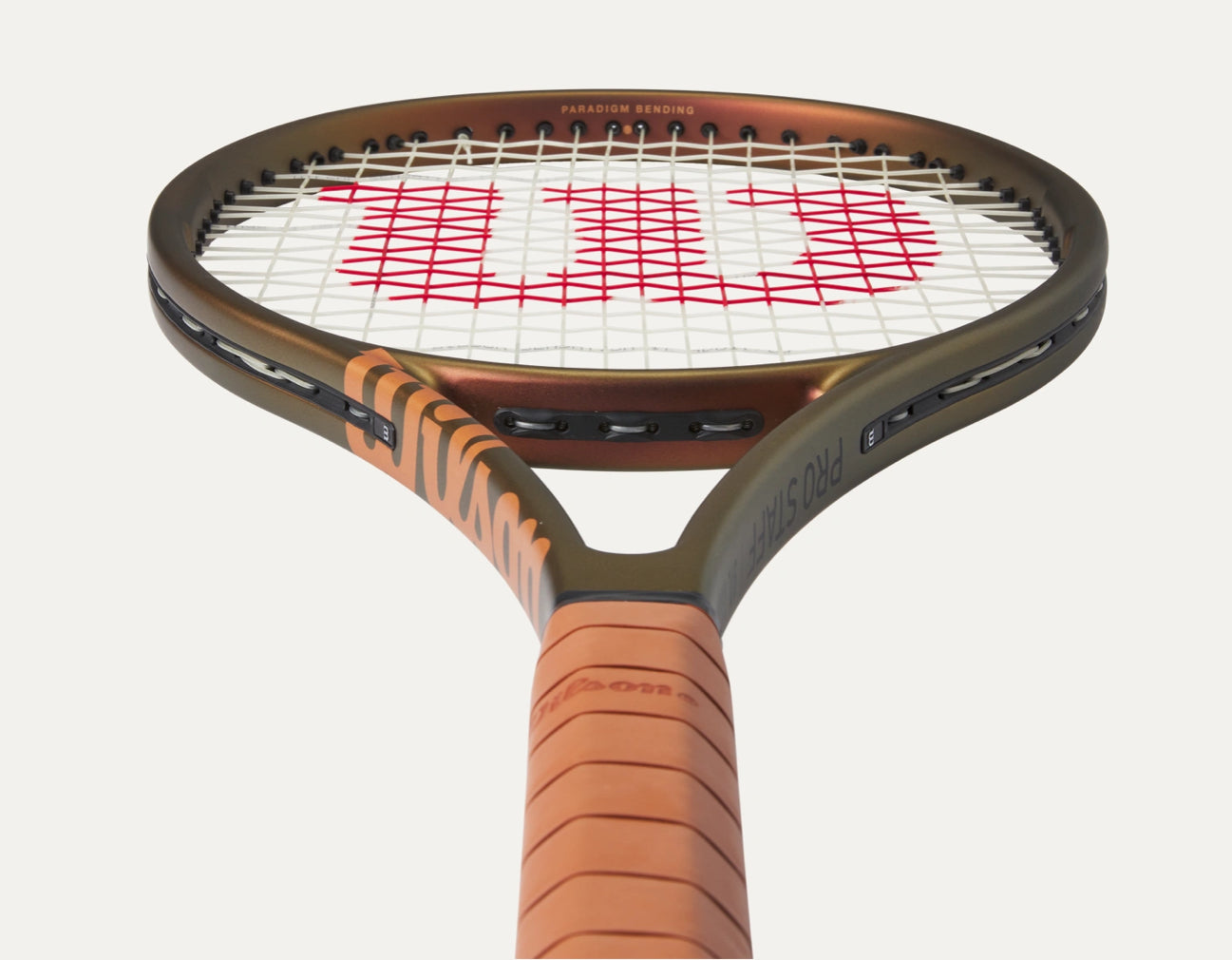 Tennis racket with Wilson branding on a white background