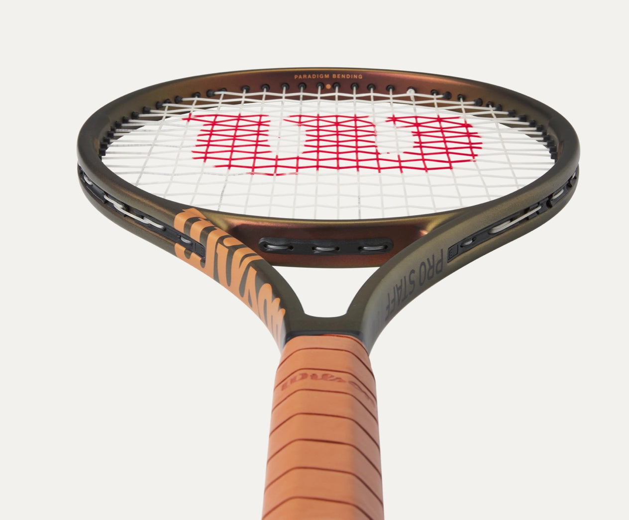 Tennis racket with Wilson branding on a white background