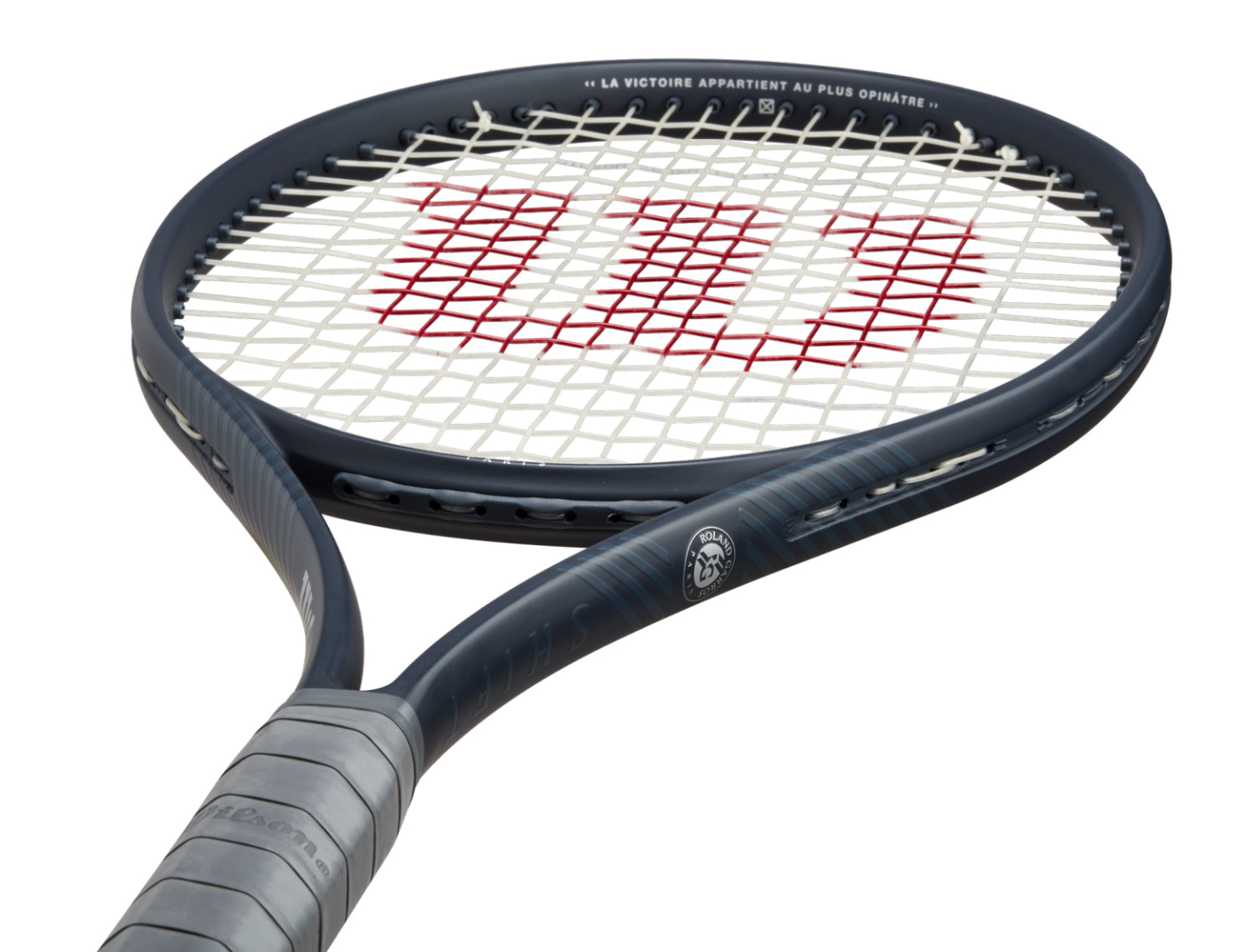 Tennis racket with Wilson logo on a white background
