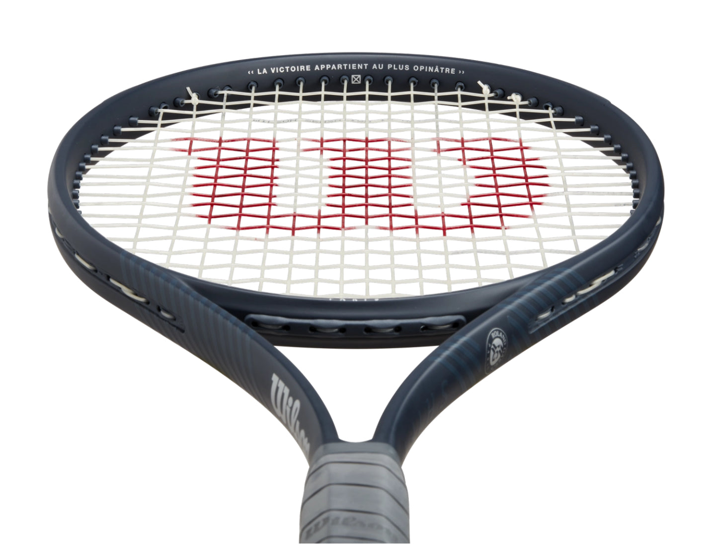 Tennis racket with Wilson logo on a white background