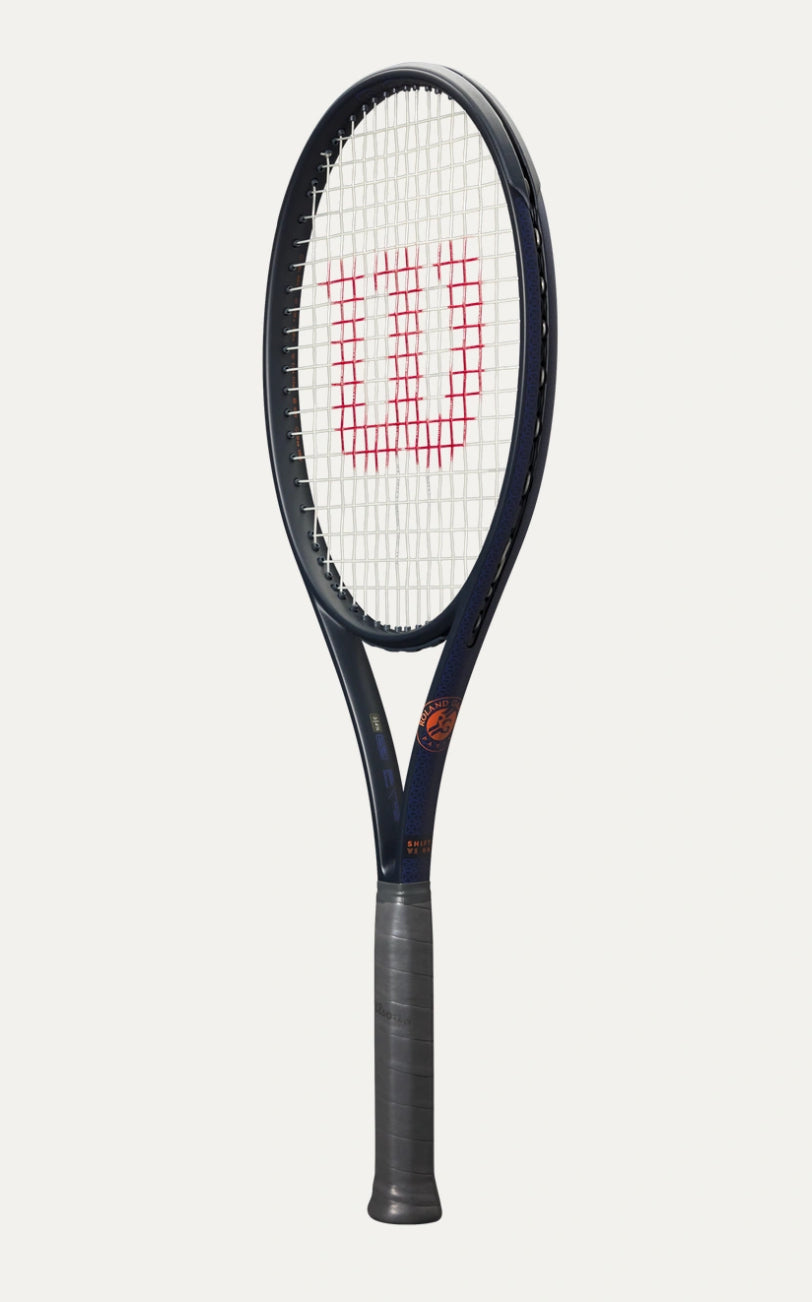 Tennis racket with Wilson logo on a white background