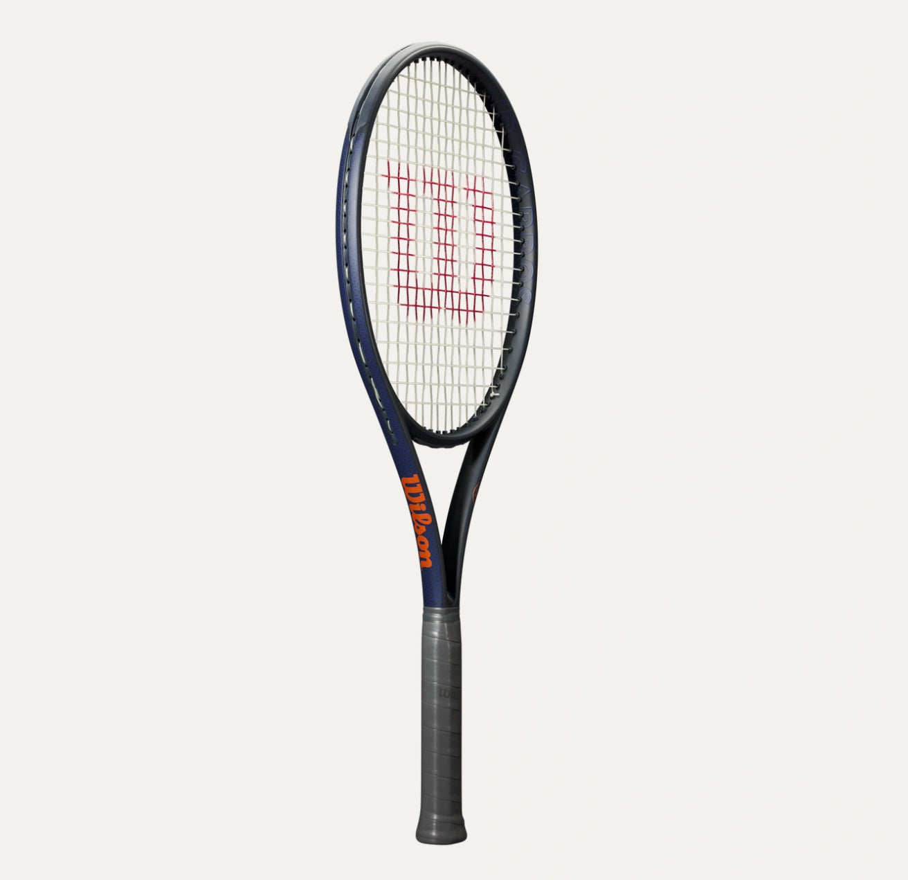 Tennis racket with Wilson branding on a white background