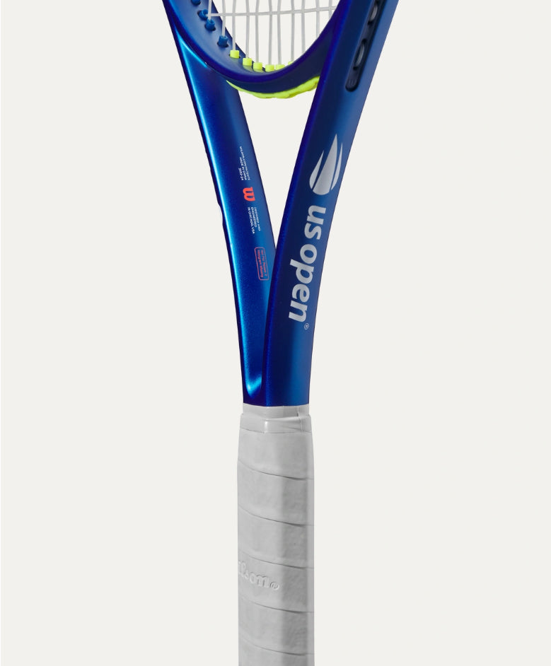 Blue tennis racket with white text on a white background