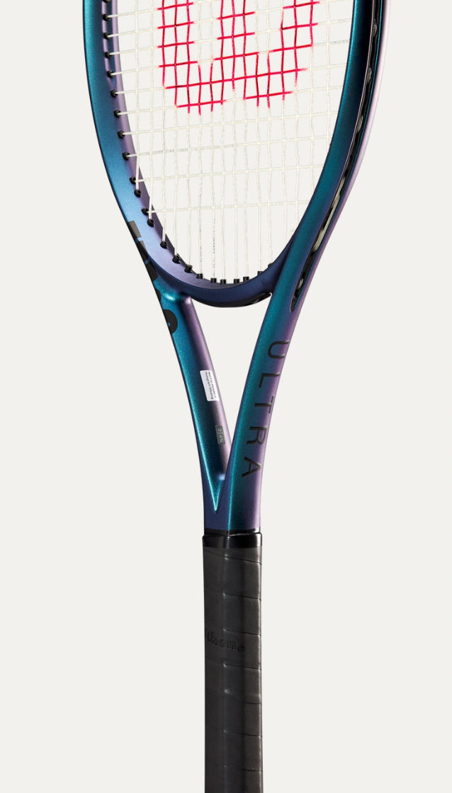 Tennis racket with Wilson logo on a white background