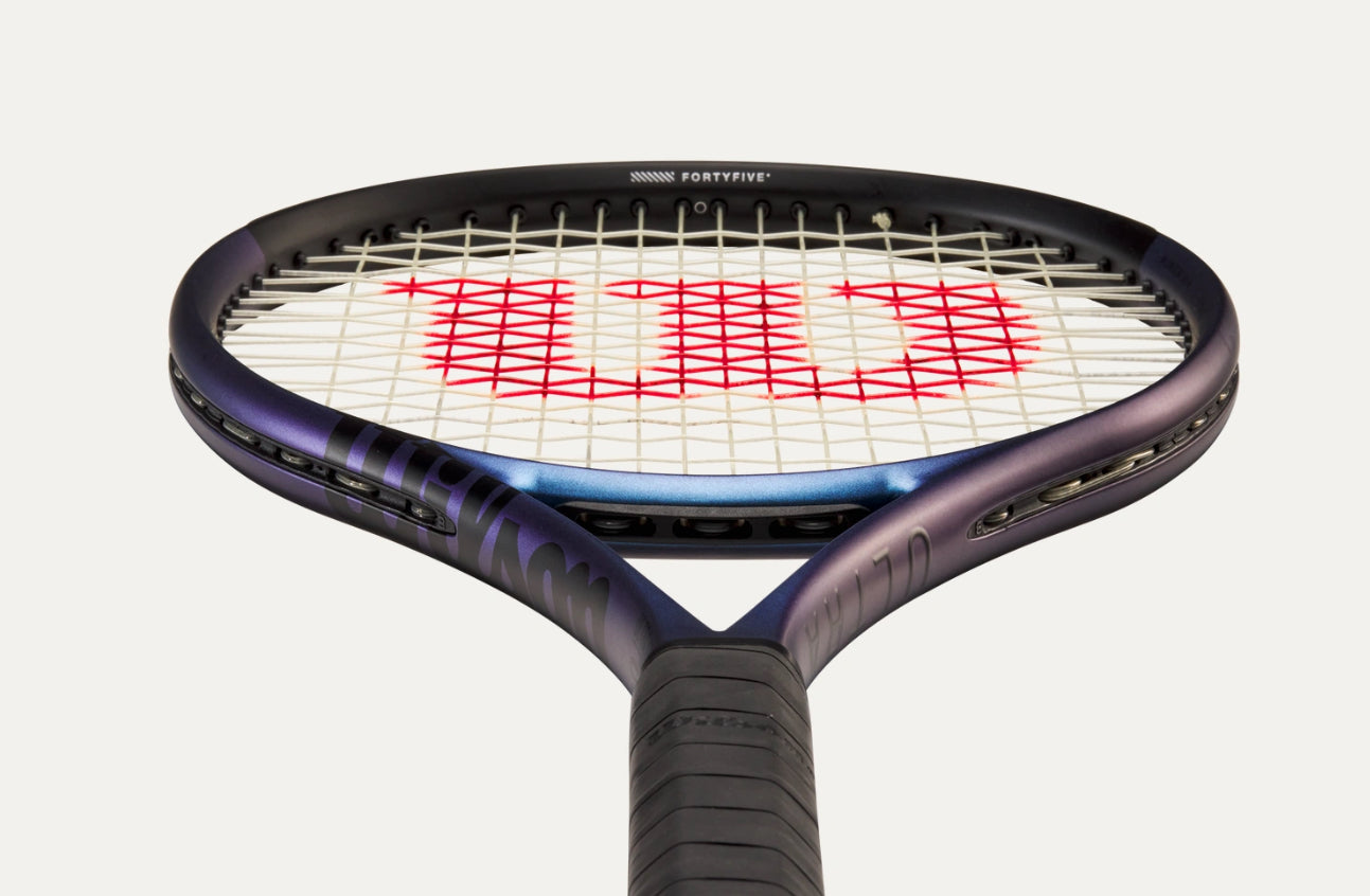 Tennis racket with Wilson logo on a white background