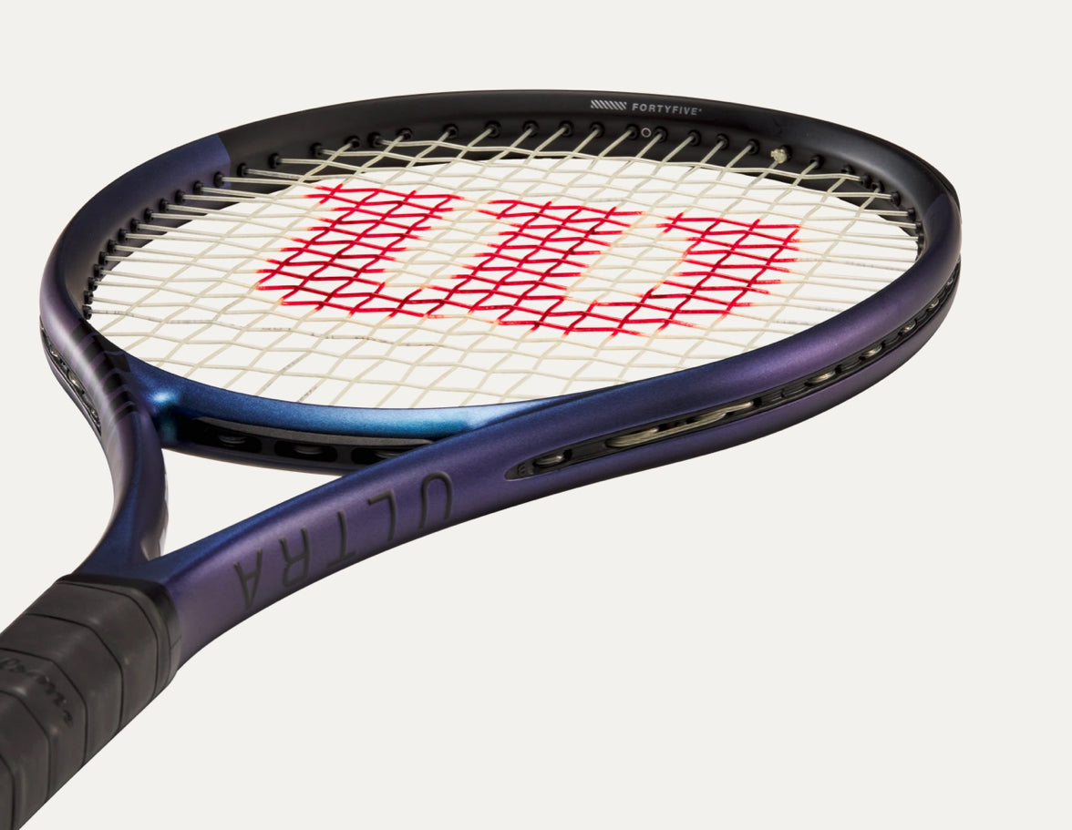 Tennis racket with Wilson logo on a white background