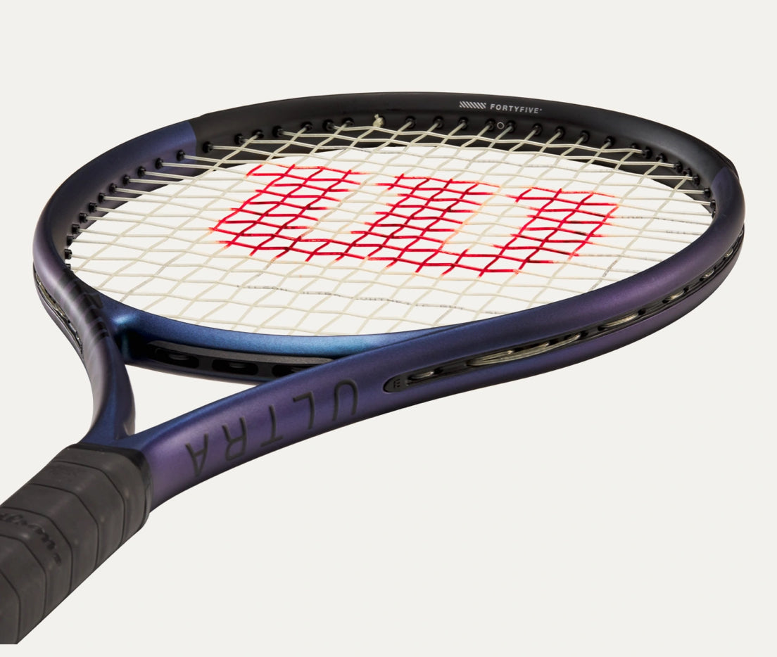 Tennis racket with Wilson logo on a white background